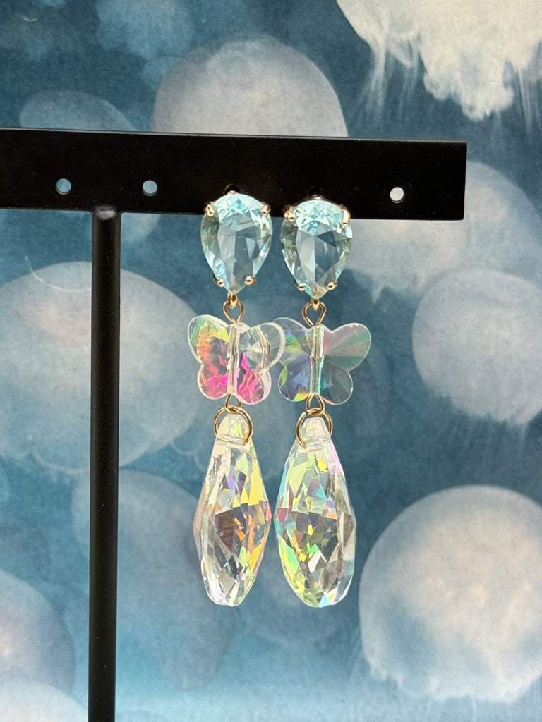 transparante oorbellen met vlinder hanger