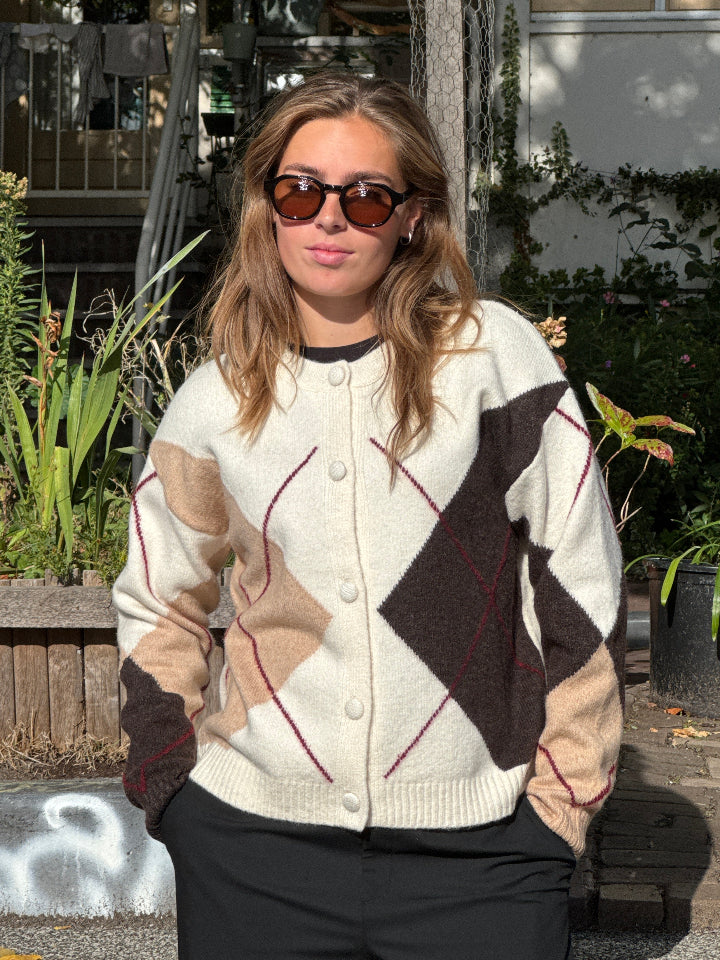 off white geruit vest met knopen en ronde hals